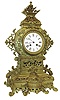 France, gilt brass mantel clock, the architectural cast brass case heavily ornamented with scrolls and acanthus, gadrooning, and much other decoration which defies description, Gothic Roman numeral white enamel dial, blued steel Breguet style hands, 8 days, time and strike, pendule a Paris movement, c1880