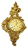 Westerstrands, Sweden, cartel clock, carved gilt wooden case in the rococo style, Roman numeral painted dial, gilt hands, 8 days, time and strike, movement, pendulum with gilt Helios mask, mid 20th century