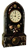Terry & Andrews, Bristol, Conn., 8 days, time and strike, cast iron case with Mother-of-Peal inlay, c1850