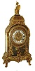 France, large Louis XV style boulle clock with music box in the base, clock case richly ornamented with gilt, cast brass mounts, and with Boulle work, the engraved scroll cut brass sheets with tortoise shell inlay, case also with removable top, surmounted by a seated female figure with shield and spear, cast brass dial with Roman numeral white enamel cartouches and repousse style decoration, blued steel hands, brass 8 days, time and strike, movement, and pendulum with gilt mask of Helios, the base concealing a music box, 8 3/8 x 2" cylinder with 2 combs, playing 6 - 8 tunes, c1860
