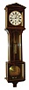 Reproduction "Laterndluhr", bench made Brazilian rosewood veneered case with light wood borders, Roman numeral white enamel dial, blued steel hands, brass 8 day timepiece movement, polished brass pendulum and weight, late 20th century