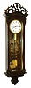 Austria, Vienna regulator, Biedermeier style, ebonized case with applied carved composition ornament, the removable, pierced crest with c scrolls and central mask, bottom bracket with gilt ornament, rosewood veneered backboard also with gilt ornament in the baroque style, Roman numeral white enamel dial with cast piecrust bezel, blued steel hands, 8 day timepiece movement, polished brass pendulum and weight, c1860