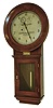 Warren Telechron Co., Ashland, Mass., "Warren B. Master Clock", (No. 127 Frequency Clock) in a walnut case and silvered dial, 110v motor combined with quality spring movement.  Spring movement moves the center hand backwards; electric movement moves it forward, c1925