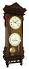 Waterbury Clock Co., Waterbury, Conn., "Calendar No. 25" calendar wall clock, 8 days, time and perpetual calendar, two brass weight driven movement in a walnut case with painted metal dials, c1900
