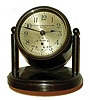 Chelsea Clock Co., Boston, for Bigelow, Kennard & Co., "Miniature Desk Clock" 8 day time only, in bronze tilting case with 3"dial, #176203, C.1927