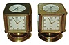Clocks- 2 (Two): Angelus, Swiss-made swiveling weather stations 8 day timepieces in brass cases with barometers, Celsius & Fahrenheit thermometers, hygrometers and top compasses. Both have "CPC Golden Jubilee NCR 1954" on top.