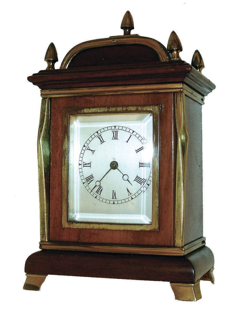 France, a small - miniature desk clock, in the form of an English bracket clock, for the London market, with a good Paris made carriage style platform lever timepiece movement, in a mahogany case with polished brass trim and 5 finials; c1890 — Antique Clocks Price Guide