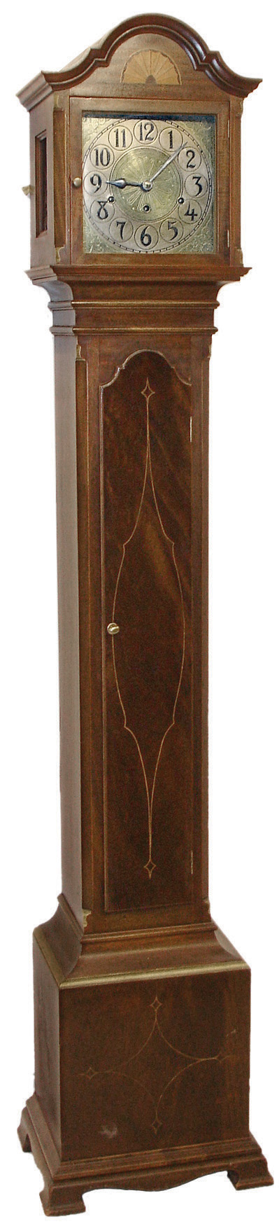 Kienzle Clock Co., Germany, for the Colonial Mfg. Co., ÓModel 1192Ò grand mother tall case clock, 8 days, time, strike and chime, spring driven movement in a mahogany inlaid case with a brass dial and carved wooden pendulum, c1920 — Antique Clocks Price Guide