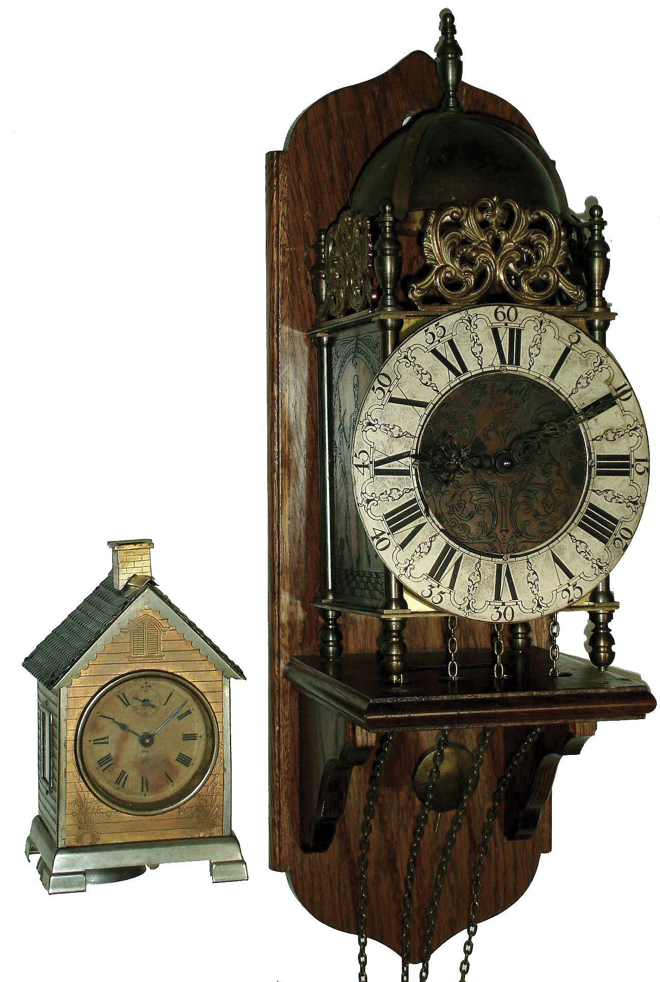 Clocks- 5 (Five) and a barometer: (1) Reproduction German, 8 days, time and strike, weight-driven lantern clock with Hermle 241-070 movement made in 1984 and wooden wall bracket; (2) Seth Thomas ÓLodgeÒ model house-shape thirty-hour, time and strike, novelty clock, c1900; (3) Winterhalder & Hoffmeir, Germany, for J.E. Caldwell & Co., inlaid mahogany, 8 days, dual chime 3 train small bracket clock with 9 jewel balance platform, c1900 (4) Barr Mfg. Corp., Weedsport, NY, electric battery mantel clock, c1920 (5) Russian modern submarine timepiece in heavy metal case, c1920 (6) German walnut hanging barometer, 20th century — Antique Clocks Price Guide