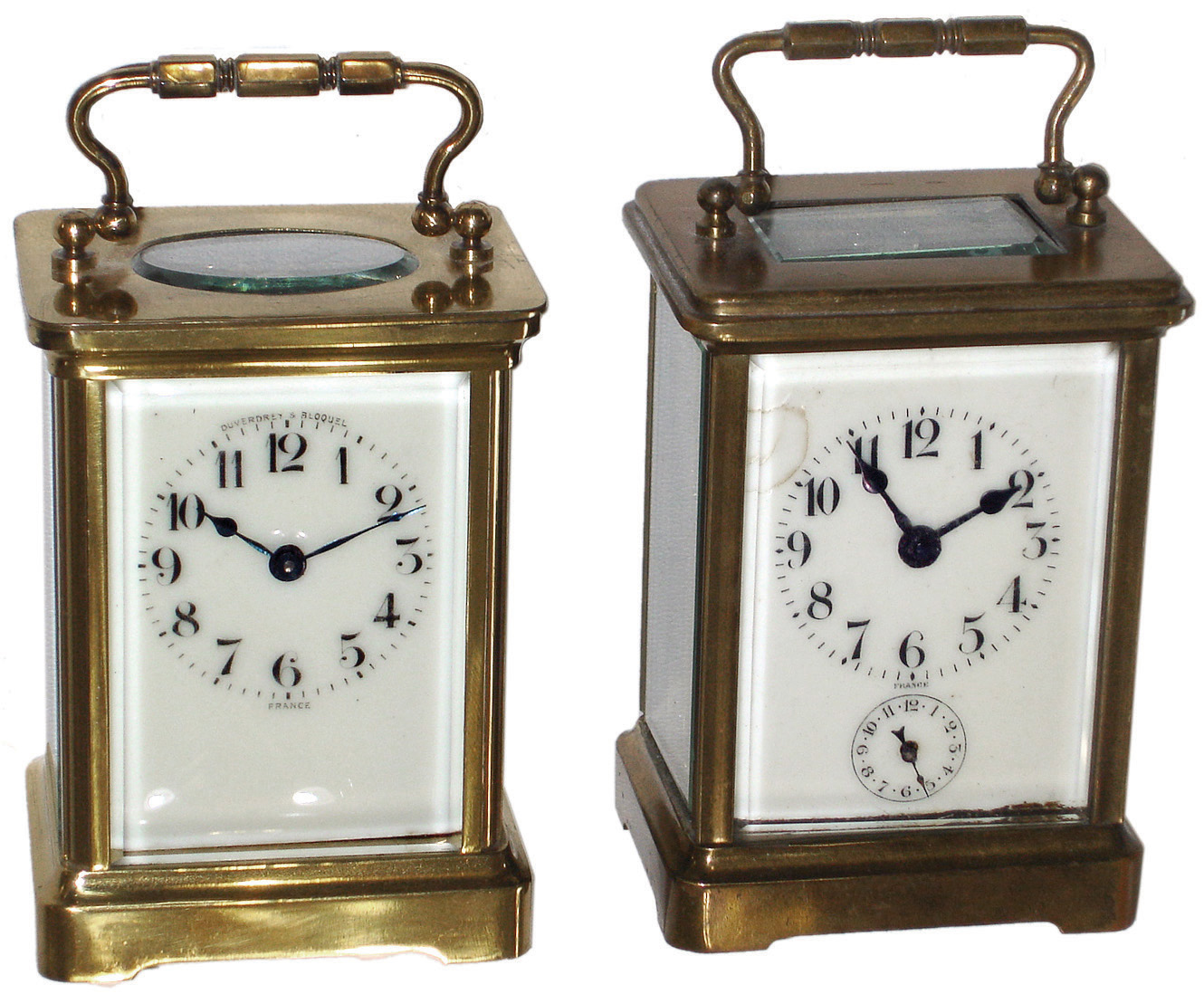 Clocks- 4 (Four) French carriage clocks, 8 days, brass and glass, early 20th century: (1), time only, by Duverdrey & Bloquel with rampant lion trademark; (2) time and alarm with rampant lion trademark; (3) Quarter Repeating, 8 days, time and strike, c1900; (4) oval and alarm, c1900 — Antique Clocks Price Guide