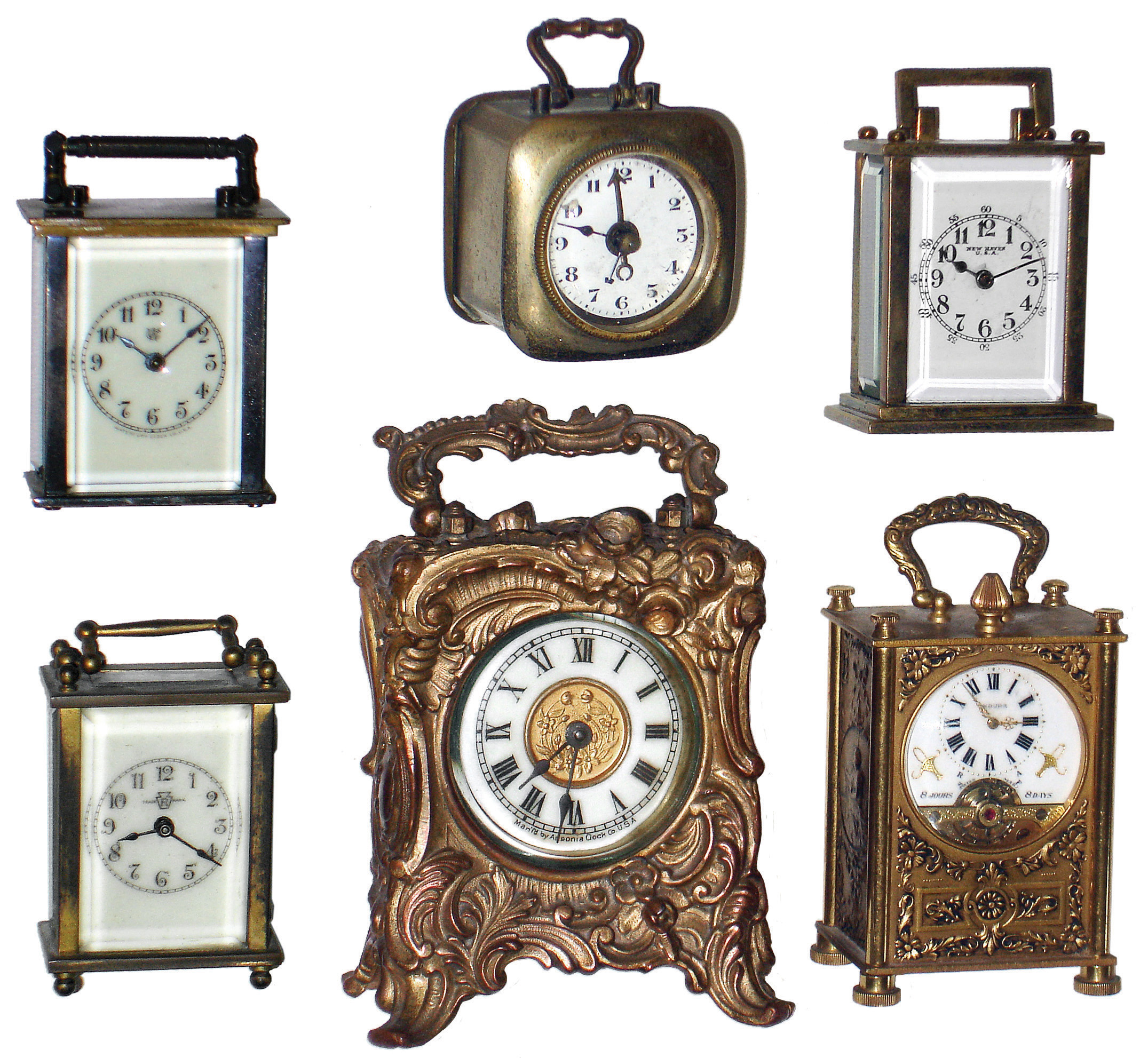Clocks- 6 (Six) small portable carriage clock timepieces: first and rarest is the Swiss, 8 days, ÓEnduraÒ Hebdomas-style with visible balance; New Haven ÓNugget; Waterbury ÒMidge and ÓSpotÒ; fancy cast case Ansonia ÓVidaÒ; and German small cube with alarm; early 20th century — Antique Clocks Price Guide