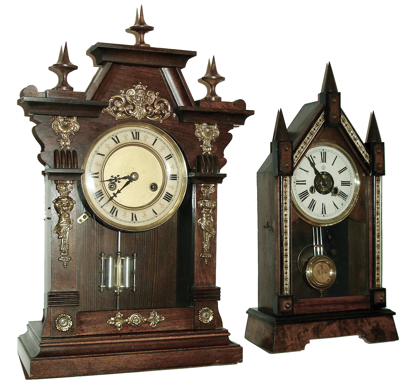 Clocks- 2 (Two): (1) Junghans Clock Co., Steeple clock with a, 30 hours, time & alarm movement in a wood case with burl decorations, c1900. (2) German shelf clock with spring driven, 8 days, time & strike movement in wood case with brass embellishments, c1920. — Antique Clocks Price Guide