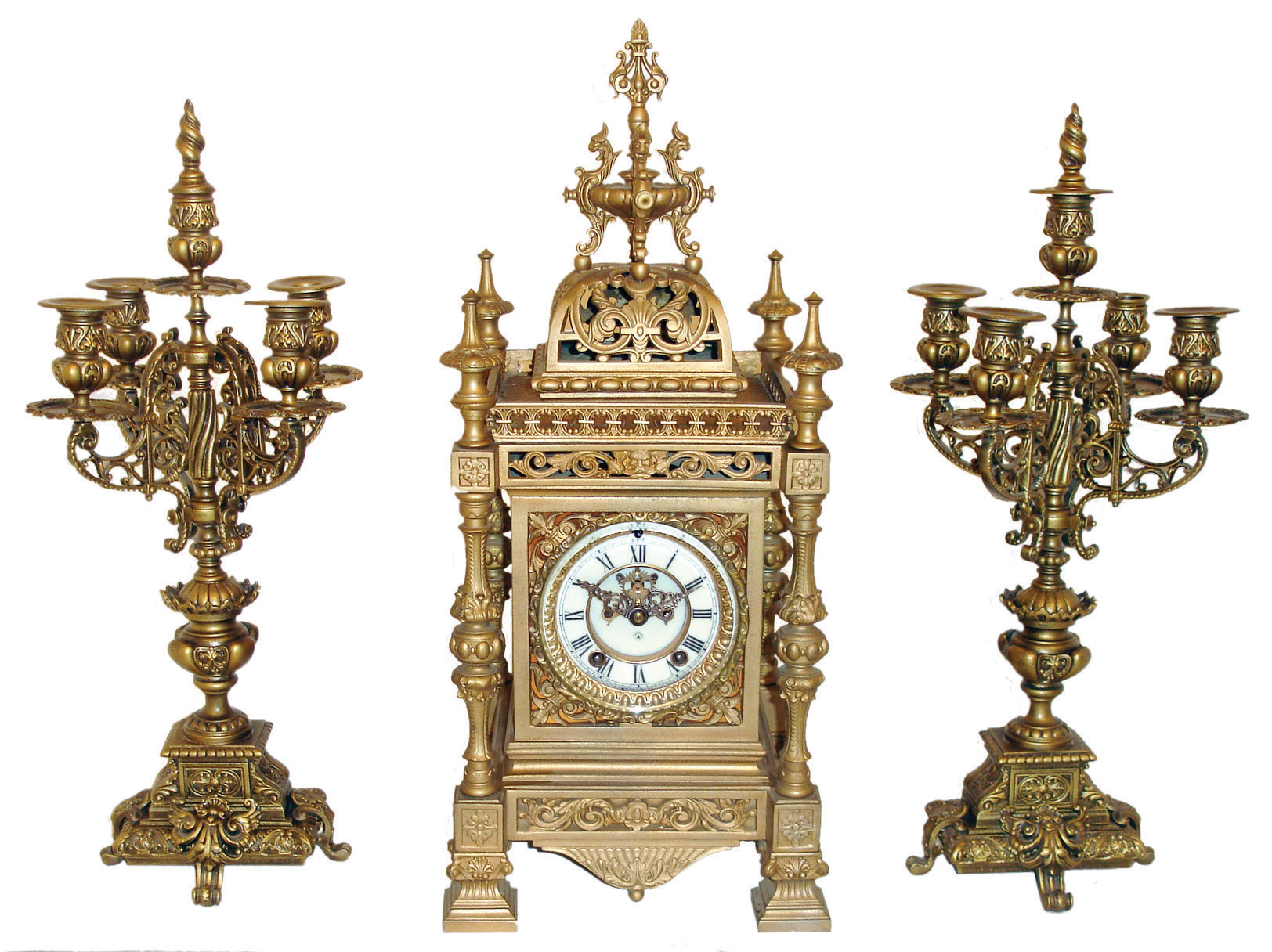 Ansonia Clock Co., New York, NY, ÒRegentÓ mantel clock with spring driven, 8 days, time and half hour strike (rack and snail) in a brass finished case with two Ansonia No. 1066 matching candelabra, c1904. — Antique Clocks Price Guide