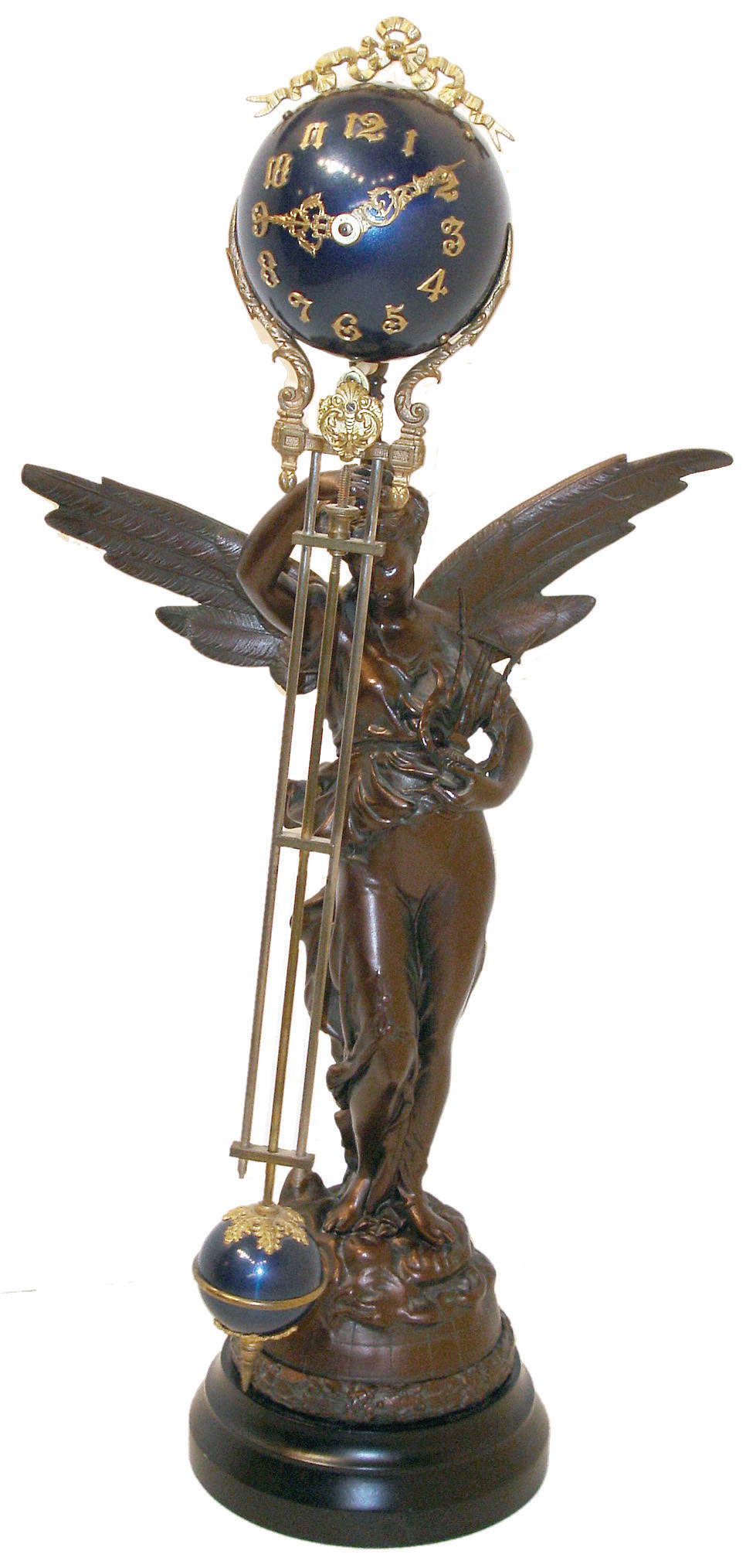 Ansonia Clock Co., New York, NY, ÓGloria Ball SwingÒ, figural mystery shelf clock, 8 days, time only, spring driven movement in a blue painted ball case with applied brass Arabic numerals and supported by winged spelter statue with a Syrian Bronze finish on an ebonized base, c1900 — Antique Clocks Price Guide