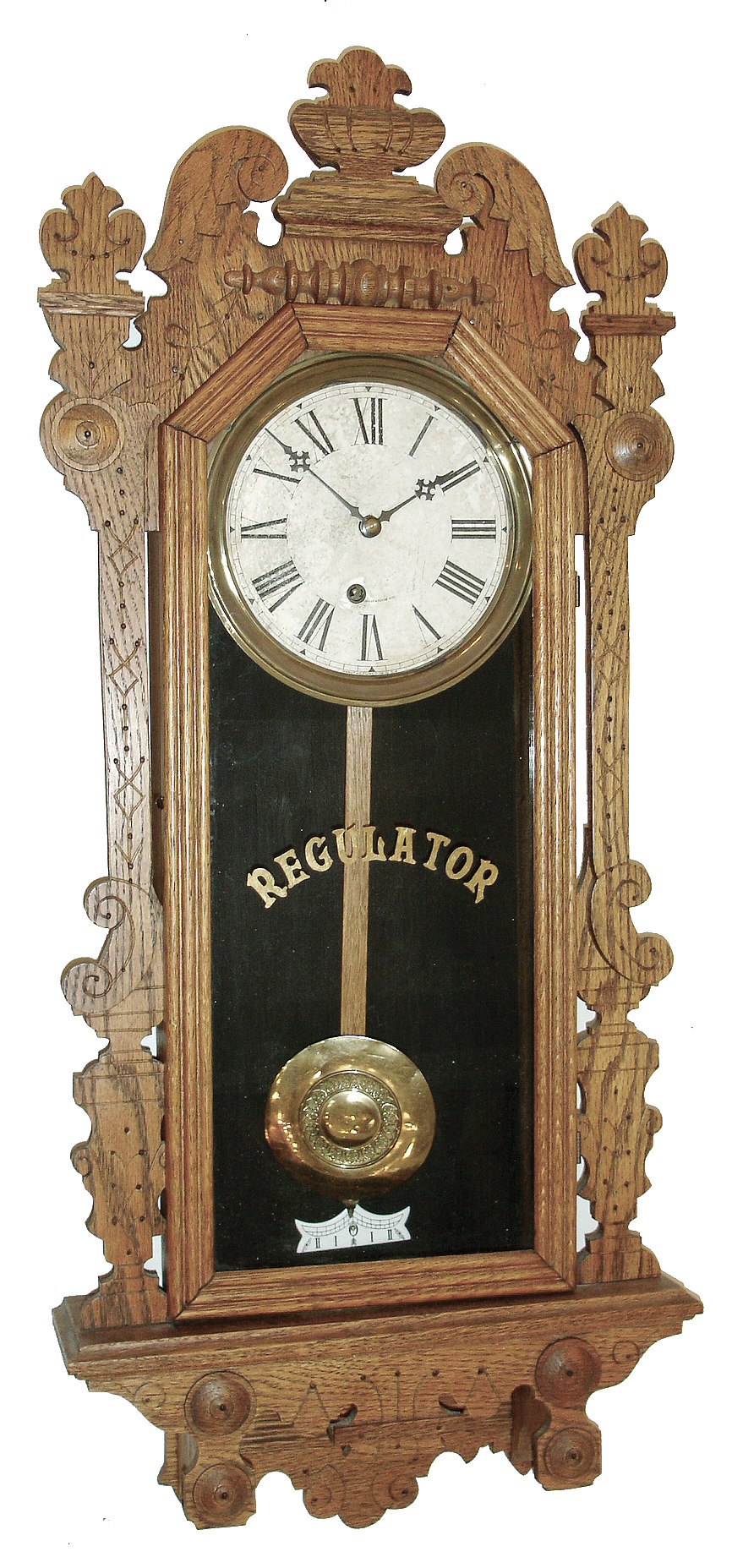 E. Ingraham & Co., Bristol, Conn., ÒArcticÓ oak, 8 days, time only, hanging gingerbread wall clock, 1896 — Antique Clocks Price Guide