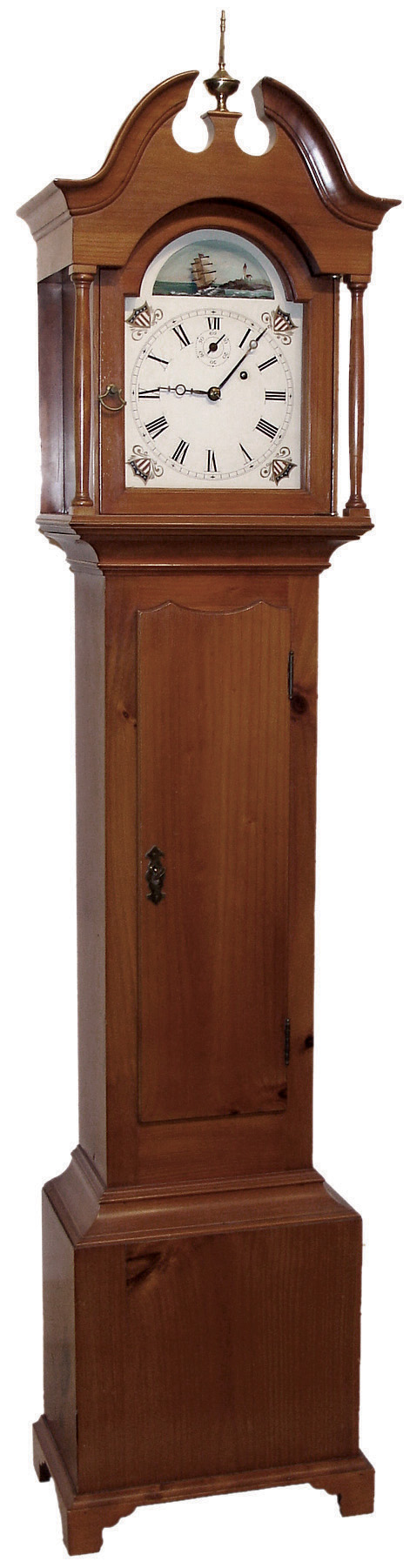 Grand mother tall clock reproduction in the manner of Elmer O. Stennes, Weymouth, Mass., 8 days, time only, weight driven movement in a pine case with a painted metal Rocking Ship dial, number 15 stamped on hood and trunk, c1980 — Antique Clocks Price Guide