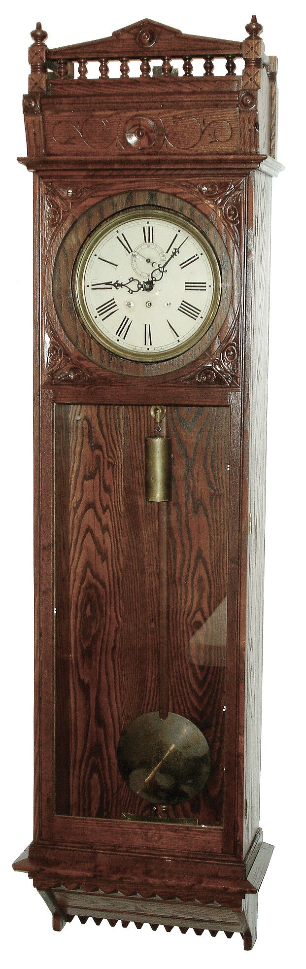 Waterbury Clock Co., Waterbury, Conn., jewelerÕs regulator wall clock, 8 days, time only, brass, weight driven, Waterbury No. 120 movement in an oak case with a painted metal dial, c1900 — Antique Clocks Price Guide
