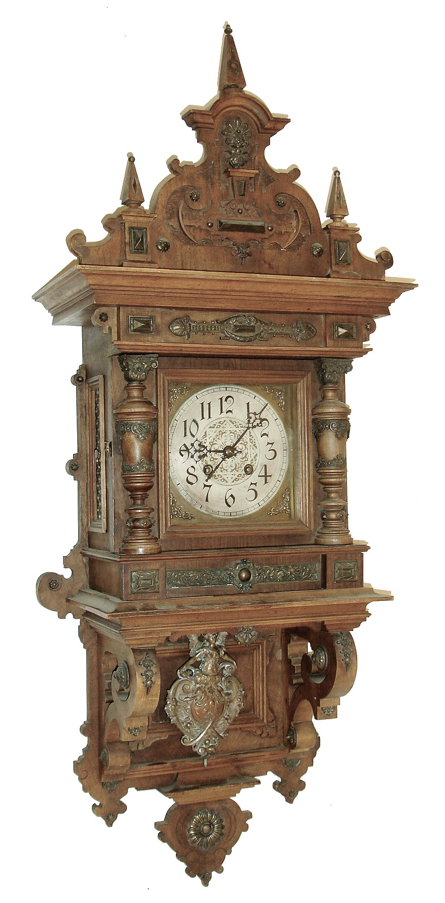 Lenzkirch, AGU, Germany, ÓFreischwingerÒ, 8 days, time and quarter hour strike, spring driven, series No. 26 movement in a walnut case with 45 pieces of cast brass ornamentation, serial number 1073443, c1895 includes original Lenzkirch winding key — Antique Clocks Price Guide