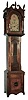 Dwarf clock, walnut Pennsylvania-style case, fitted with 8 days, time and strike, E.N. Welch Connecticut movement powered by leaf springs in base, 19th century