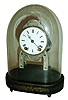 American, Terry Clock Co., Waterbury, Conn., small skeleton double spring timepiece, with embossed decorations to plates and to the trim over the dial, with good old dome, c1870