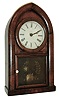 E. & A. Ingraham, Bristol, Conn., ÓBeehiveÒ or ÓRound GothicÒ shelf clock in a rosewood and mahogany veneer case, c1854