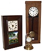 Clocks- 3 (Three): (1) German, 400-day or rotary pendulum mantel clock. (2) Boardman & Wells, Bristol, Conn., 30 hours, time, strike and alarm, weight wood movement bevel case shelf clock, c145. (3) European (German?), electric wall regulator. Dial marked ÒNTÓ.