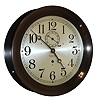 Chelsea Clock Co., Chelsea, Mass., ÒPilot HouseÓ, wall clock, 8 days, time only, spring driven movement in a patinated bronze case with an 8 1/2Ò Arabic numeral silvered dial, serial No. 128192, c1920.