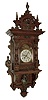Lenzkirch, AGU, Germany, walnut ÓFreischwingerÒ, time and quarter hour strike. This model similar to the model 89 in the 1892 catalog, but this one has a different brass trim beneath the dial, serial number 1252579 , c1900 includes original Lenzkirch winding key