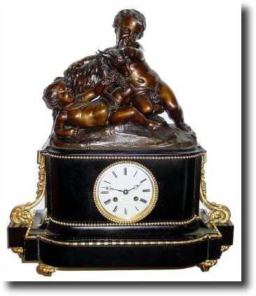 C.1820, French, Bronze Figural clock, a wonderful motif of two young boys feeding grapes to their pet goat. — Antique Clocks Price Guide