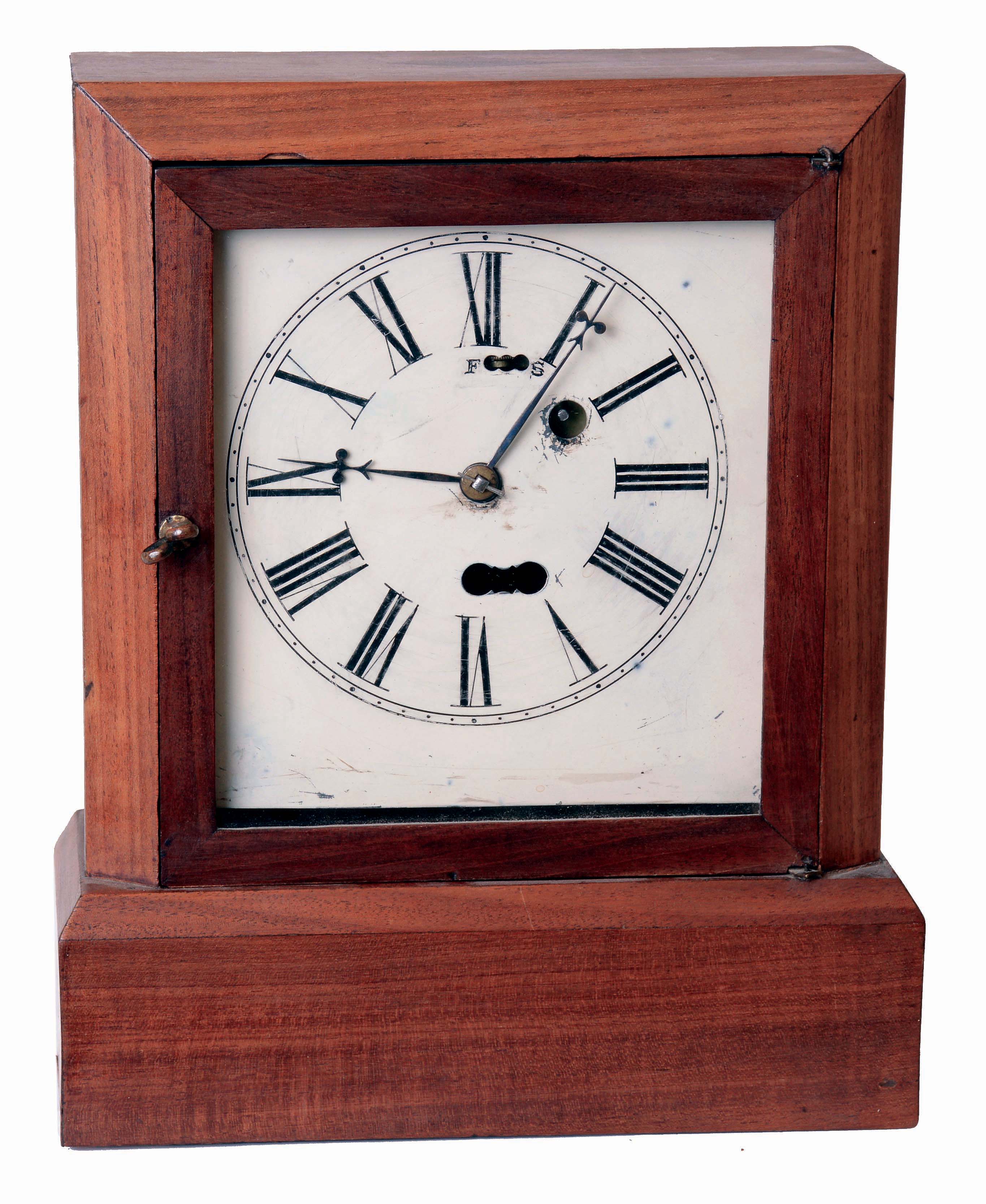 S. B. Terry & Co., Terryville, Conn., Cottage clock in a mahogany case. 30 hours, spring driven, timepiece movement with Silas B. Terry's patented torsion escapement, c1853. — Antique Clocks Price Guide