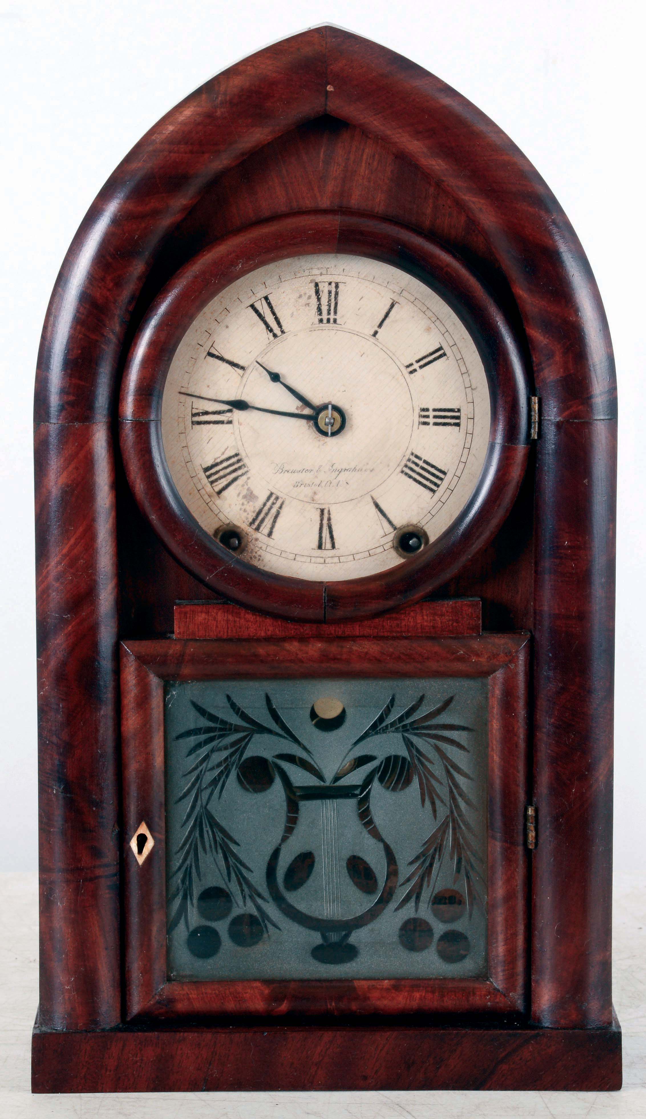 Brewster & Ingrahams, Bristol, Conn., 8 days, time and strike, spring driven brass Kirk's patent movement round gothic or beehive clock, c1845 — Antique Clocks Price Guide