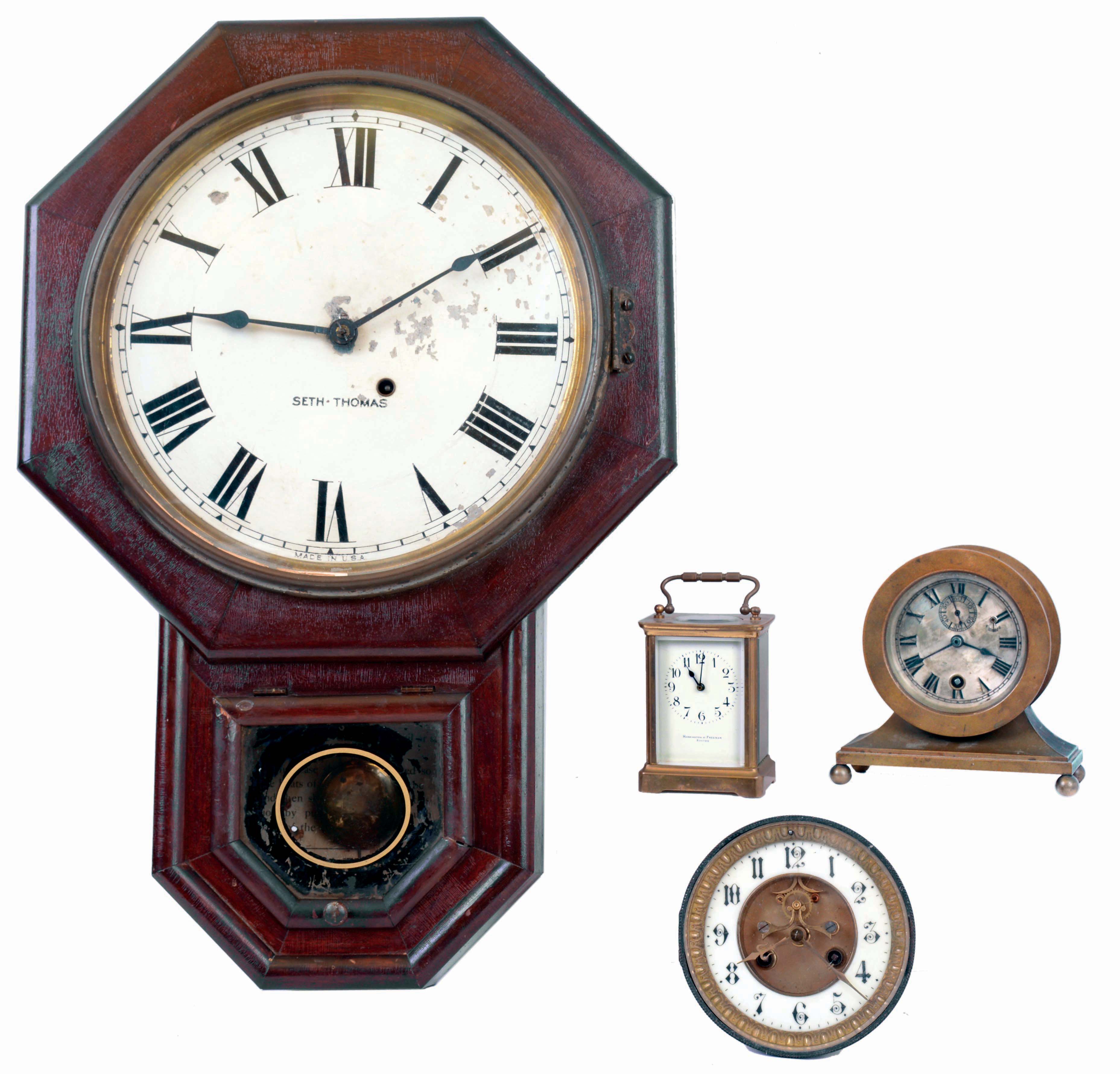 Clocks- 4 (Four) 8 day: (1) French time only, carriage clock, dial signed "Harrington & Freeman, Boston"; (2) French, time and strike, (no case) movement and dial with visible escapement; (3) Chelsea time-only "base and ball" brass desk clock low number 16538; (4) Seth Thomas short drop octogonal wall clock; early 20th century — Antique Clocks Price Guide