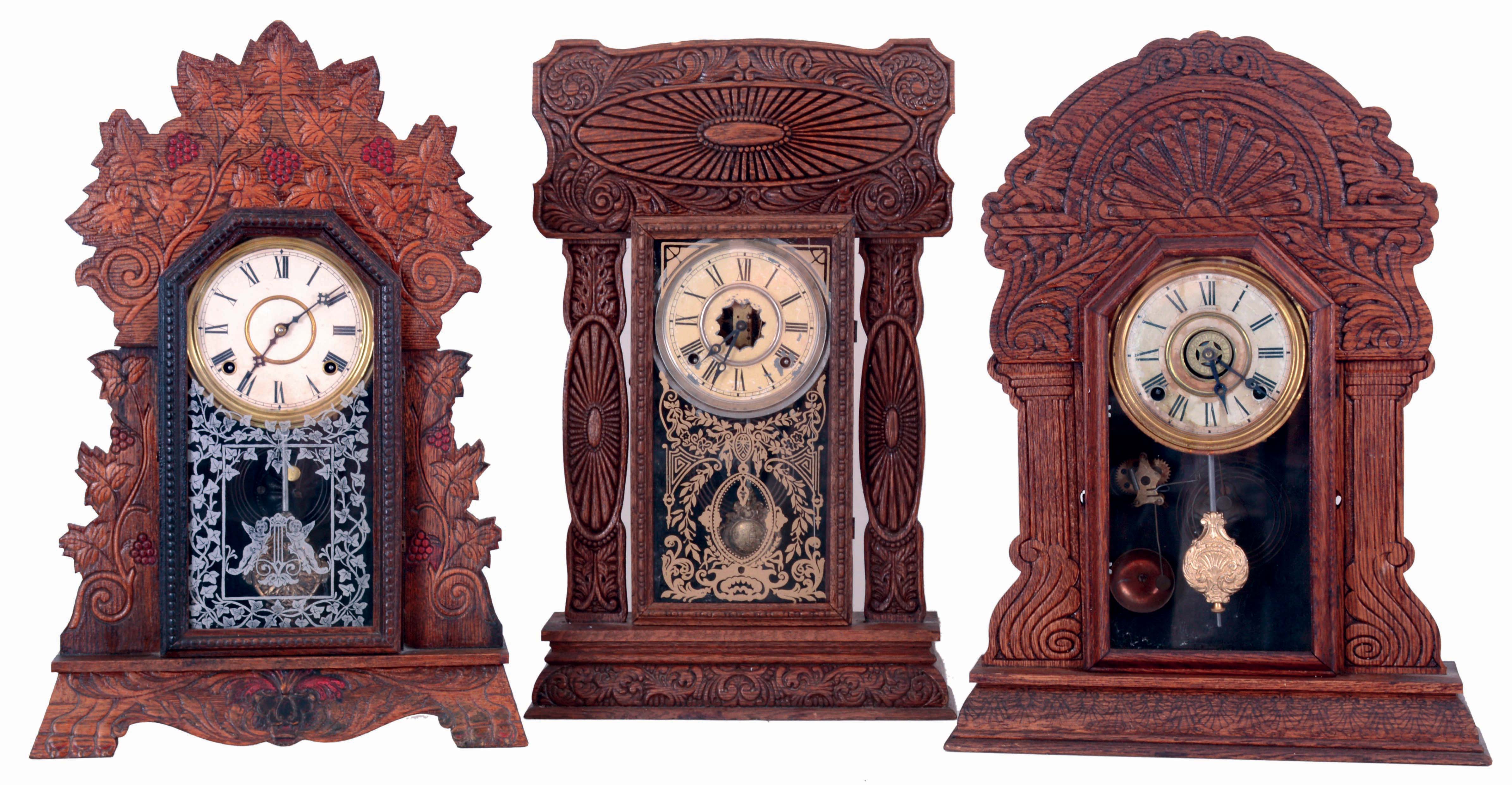 Clocks- 3 (Three): (1) Gilbert "Bouquet No. 50", 8 days, time and strike, spring driven brass movement shelf clock. (2) E. Ingraham & Co., 8 days, time and strike, spring driven brass movement shelf clock. (3) Sessions Clock Co., "Elite No. 37", 8 days, time, strike and alarm, spring driven brass movement shelf clock, all c1905. — Antique Clocks Price Guide