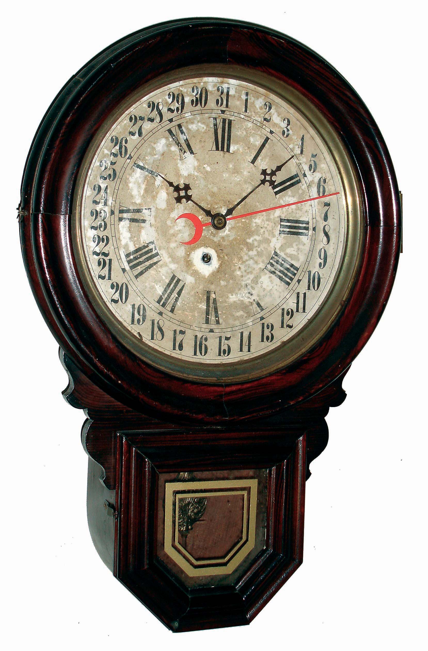 Clocks- 2 (Two), 8 days, wood case wall clocks: Ingraham "Dew Drop" rosewood-grained time and calendar; Junghans German walnut, time and strike, spring wound with unusual keyhole-style front door; early 20th century — Antique Clocks Price Guide
