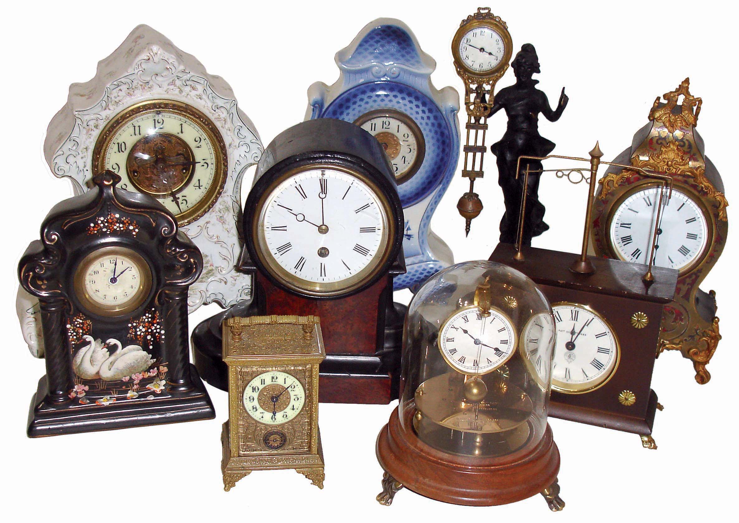 Clocks- 9 (Nine) Novelty, Porcelain, Swinger, Carriage, Mantel: includes Horolovar flying ball and Briggs rotary; modern figural swinger (Asian); 3 porcelain including Waterbury with visible escapement; French time & alarm carriage clock; and small French mantels; early and later 20th century — Antique Clocks Price Guide