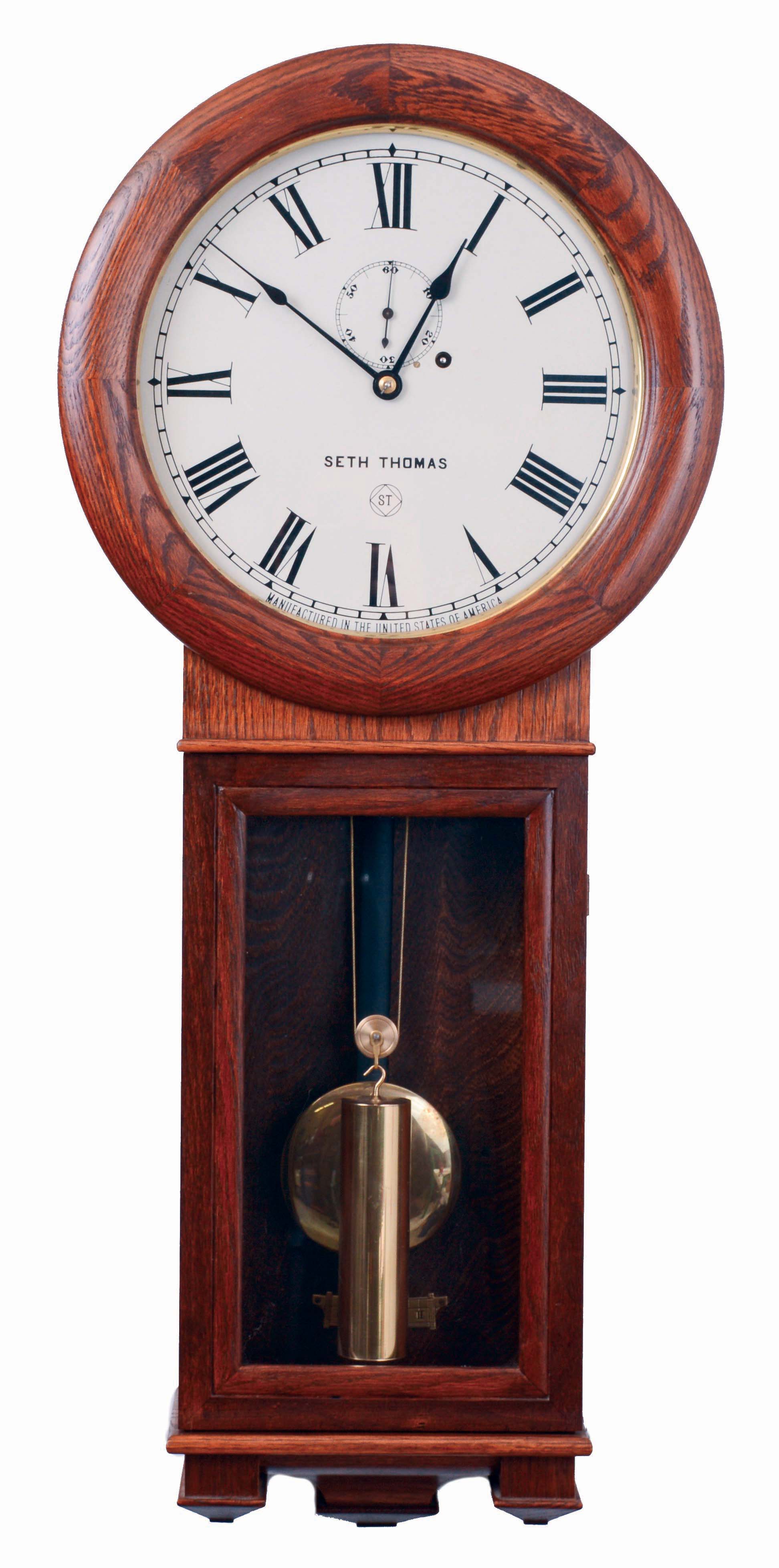 Seth Thomas Clock Co., Thomaston, Conn., "Regulator No. 2" reproduction in an oak case with a weight driven timepiece movement, c1978. — Antique Clocks Price Guide