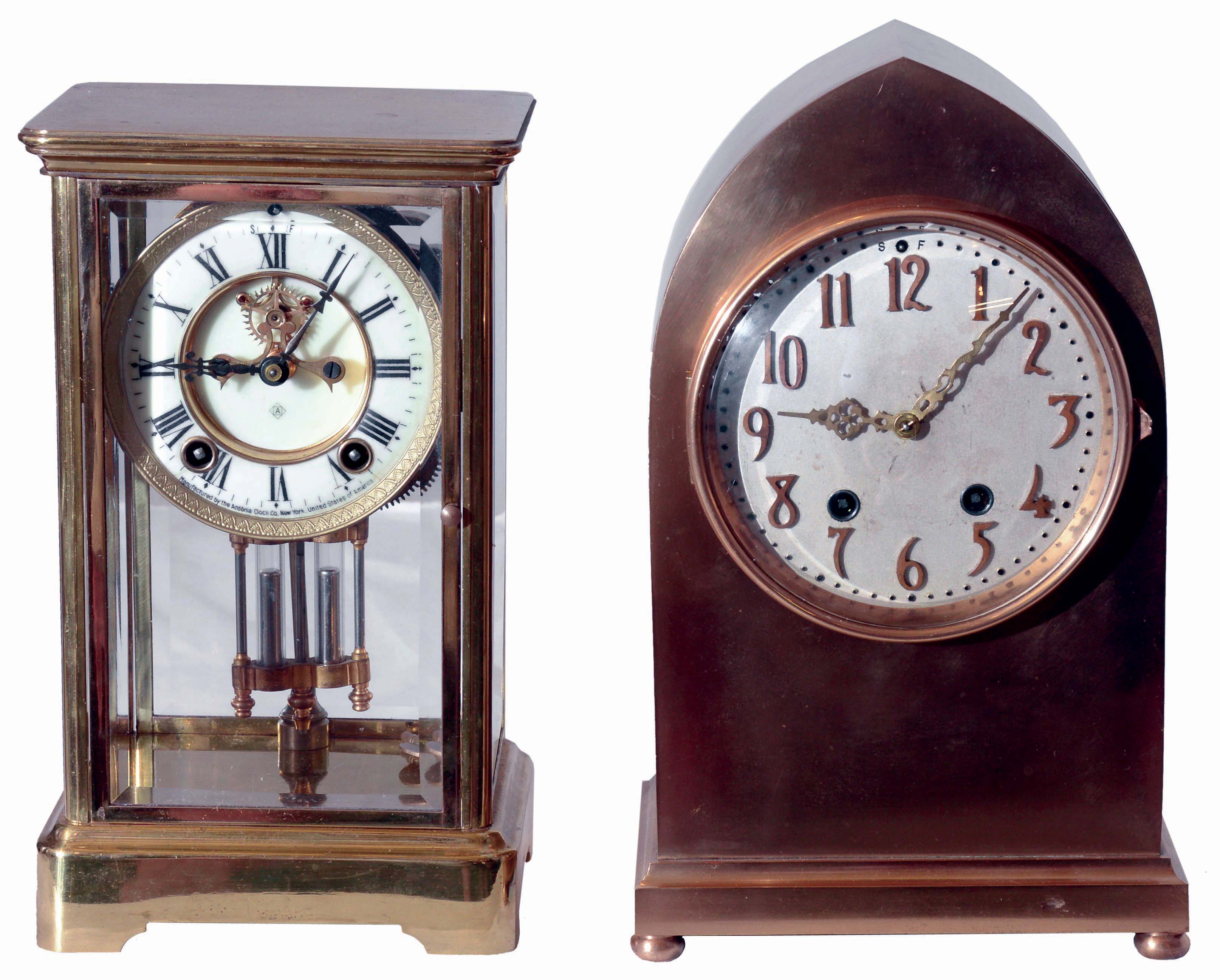 Clocks- 2 (Two): (1) Ansonia Clock Co., Ansonia, Conn., "Prism', 8 days, time and strike, spring driven brass movement crystal regulator shelf clock, c1905. (2) Seth Thomas Clock Co., Thomaston, Conn., "Gothic No. 1", 15 day, time and strike, spring driven brass movement mantel clock, c1913. — Antique Clocks Price Guide