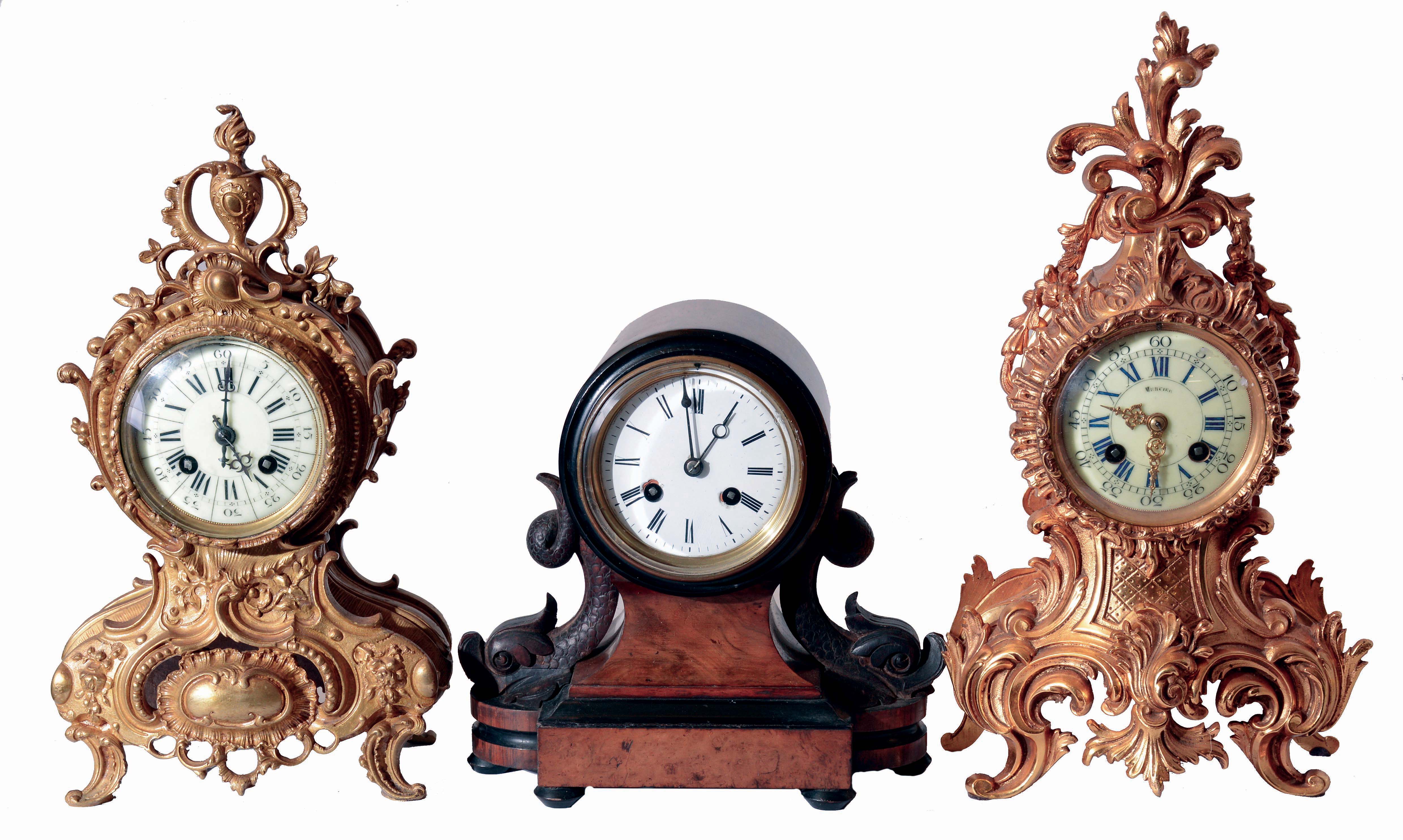 Clocks- 3 (Three): (1) French, A.D. Mougin, 8 days, time and strike, spring driven brass movement mantel clock. (2) French, Marti & Cie, 8 days, time and strike, spring driven brass movement mantel clock. (3) French, Japy Freres, 8 days, time and strike, spring driven brass movement mantel clock. — Antique Clocks Price Guide