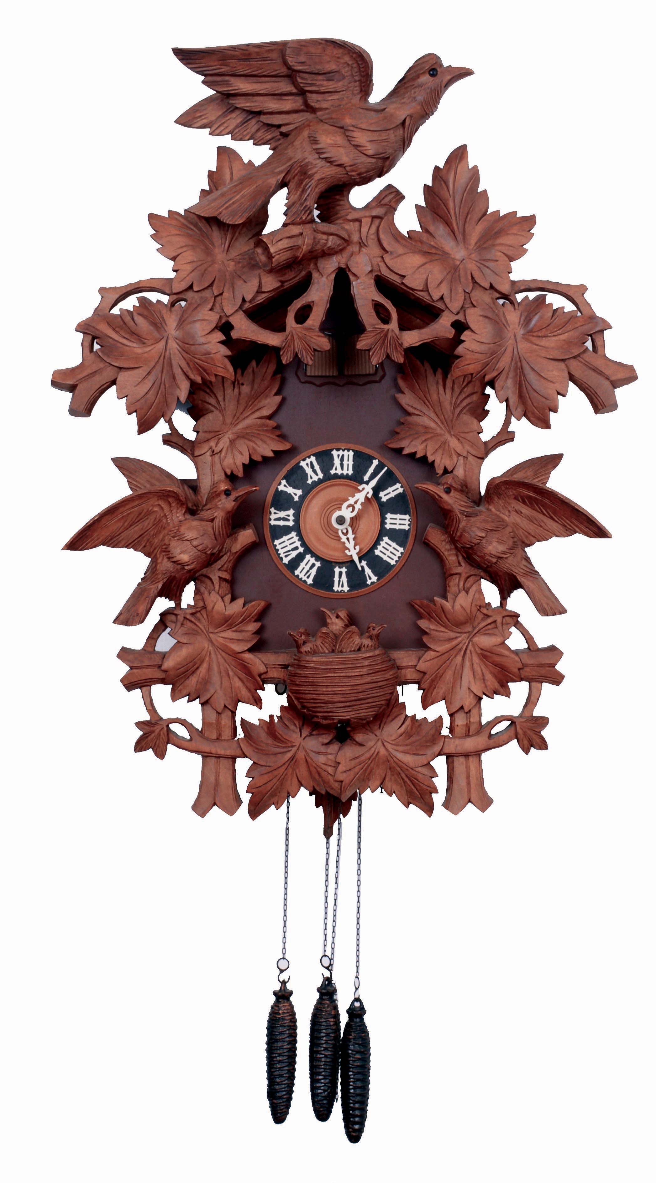 German, large carved cuckoo clock, 3-bird and 10-leaves with 3 chicks in the nest, cuckooing on the hour and a single call on the half hour, and the hours followed by a lively musical tune, with the left door at top opening up to reveal the "conductor", pull wind 3 weights each day, c1985 — Antique Clocks Price Guide