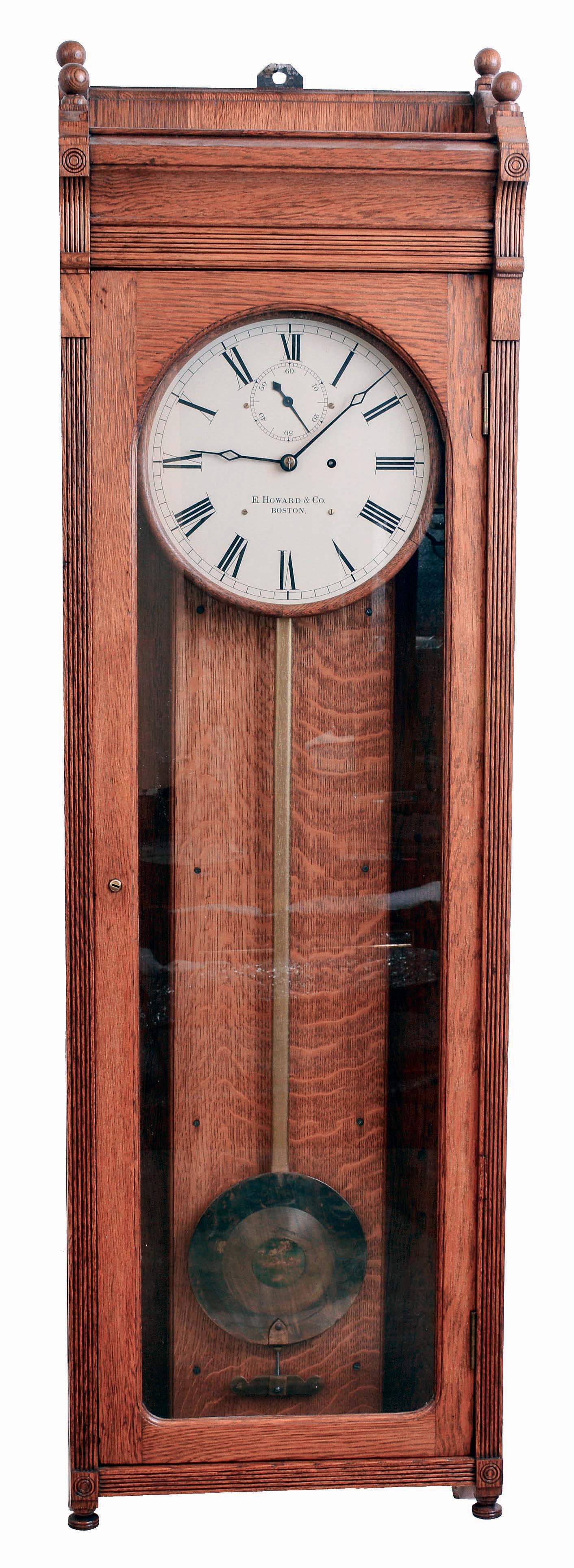 E. Howard & Co., Boston, Mass., "No. 89 Regulator", wall clock, 8 days, time only, weight driven movement in an oak case with painted metal dial, c1890 — Antique Clocks Price Guide