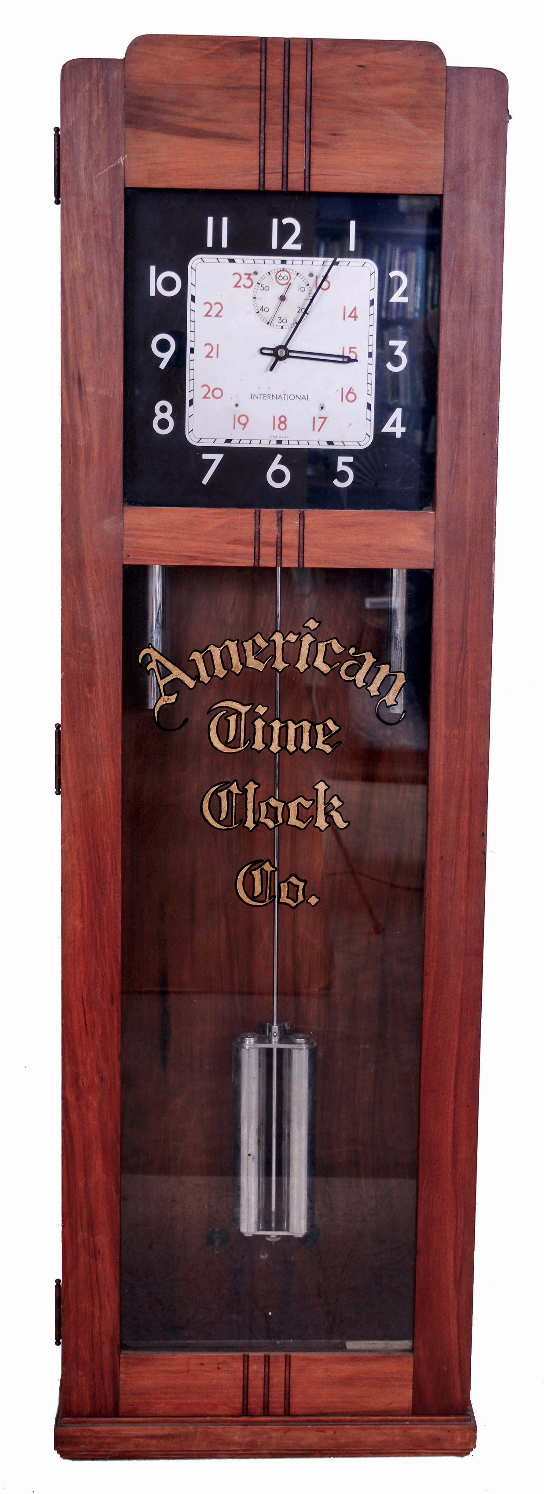 International Business Machines Corp., Endicott, NY, "Model 35" Art Deco self-winding office regulator wall clock, time only, weight driven electrically wound movement in a cherry case with reverse painted door glass "American TIme Clock Co.", painted aluminum dial and nickel finished weights and pendulum, serial #680641SD, c1935 — Antique Clocks Price Guide