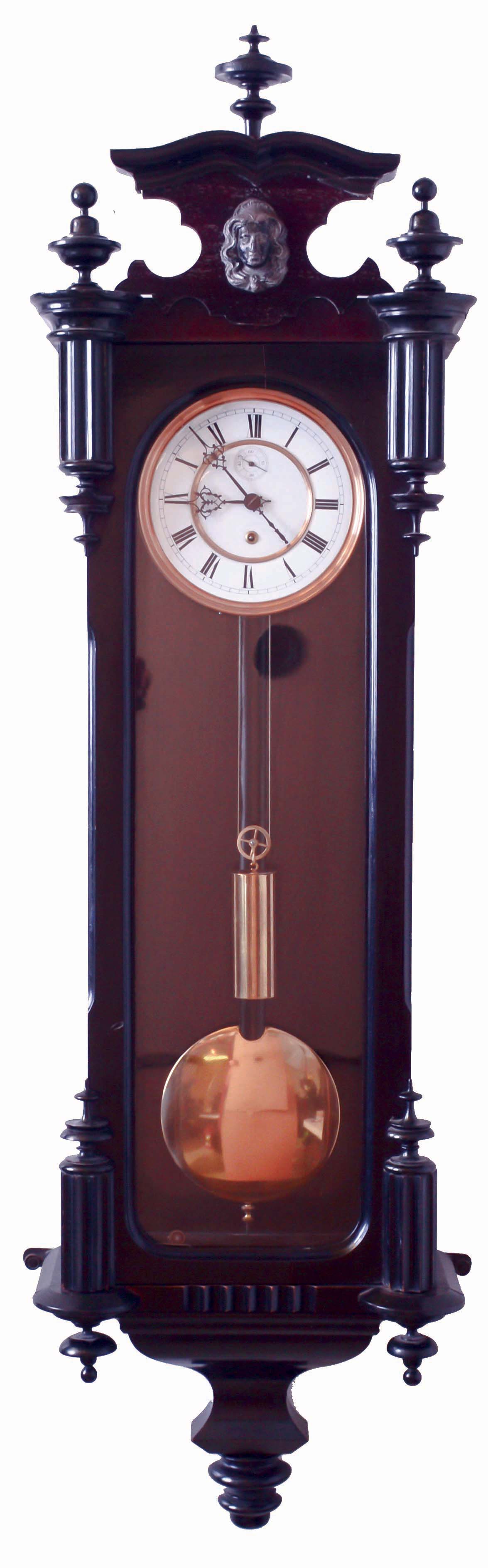 Lenzkirch, Germany, single weight wall timepiece, in a ebonized case, with partial finials pointing toward the center of the door, and with original top crest, c1875. — Antique Clocks Price Guide