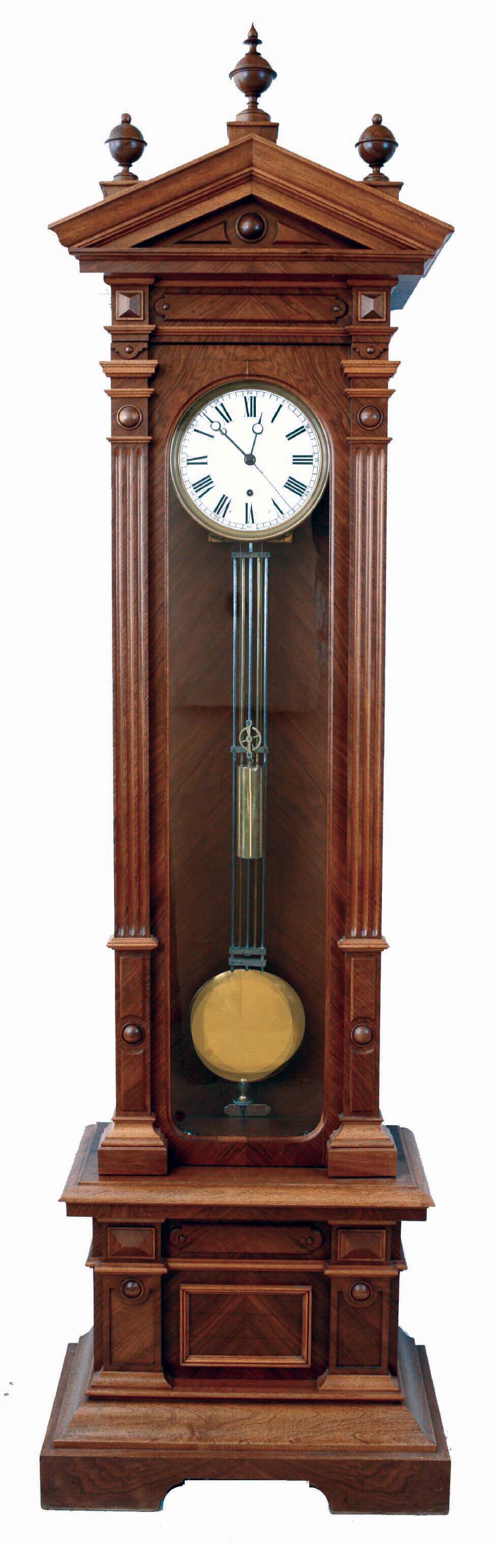 Lenzkirch, Germany, standing regulator, walnut and matched walnut veneer case of architectural form, ornamented with applied moldings, turned elements, and carving, Roman numeral silvered dial with brass bezel, blued steel Breguet style hands, and with center seconds hand, jeweled brass 8 day timepiece movement with deadbeat escapement and jeweled Vulliamy pallets, brass clad weight, 5 rod gridiron pendulum with lead filled brass ball, adjusting nut with engraved scale and pointer, serial #949560, c1890 — Antique Clocks Price Guide