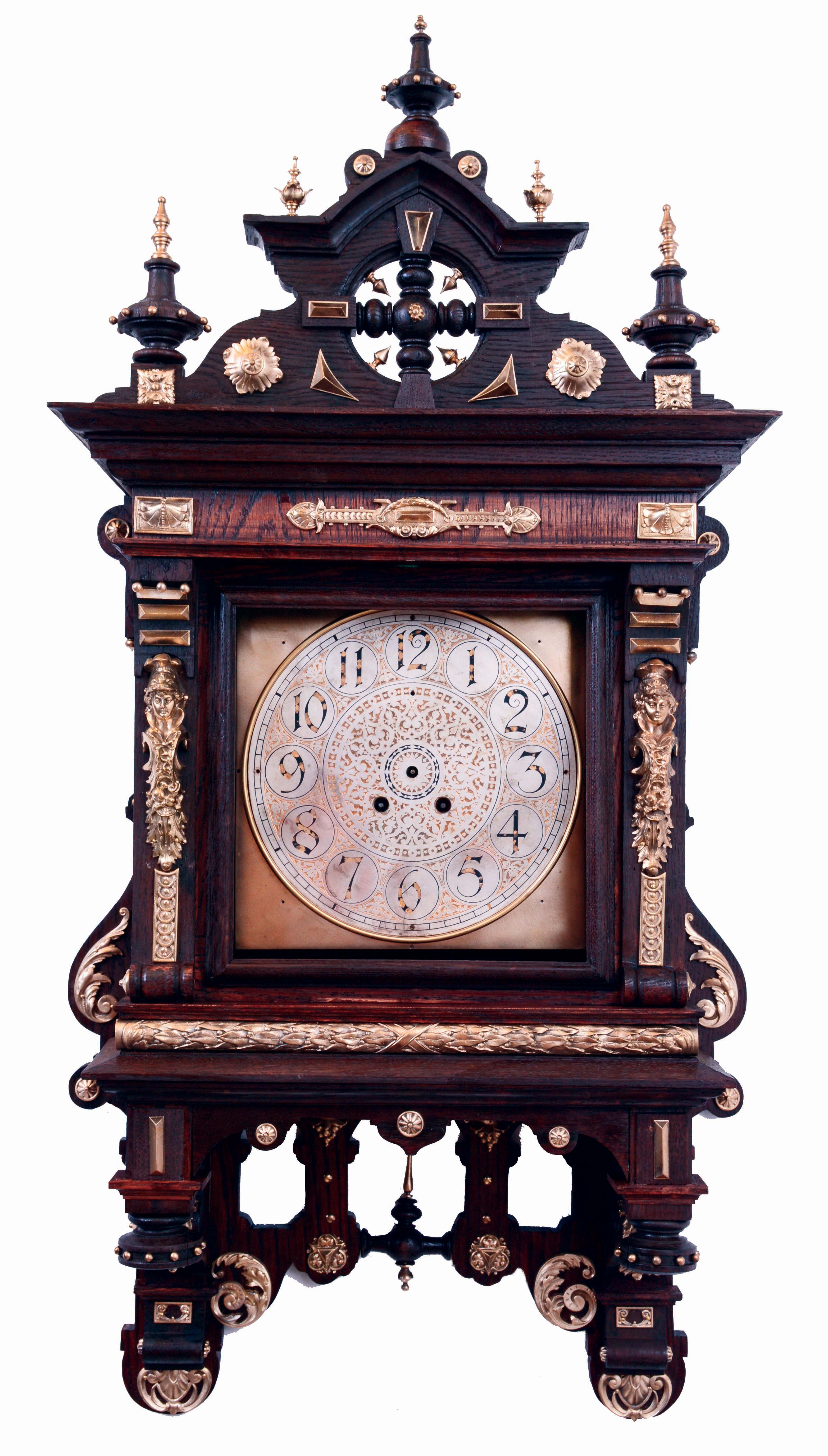 Lenzkirch, project clock, the clock case was badly damaged, but all the brass bits were intact, so a cabinet maker has carefully recreated this Gutsherrenuhr in oak, stained dark, and re-applied the original brass trimmings. C.2001 — Antique Clocks Price Guide