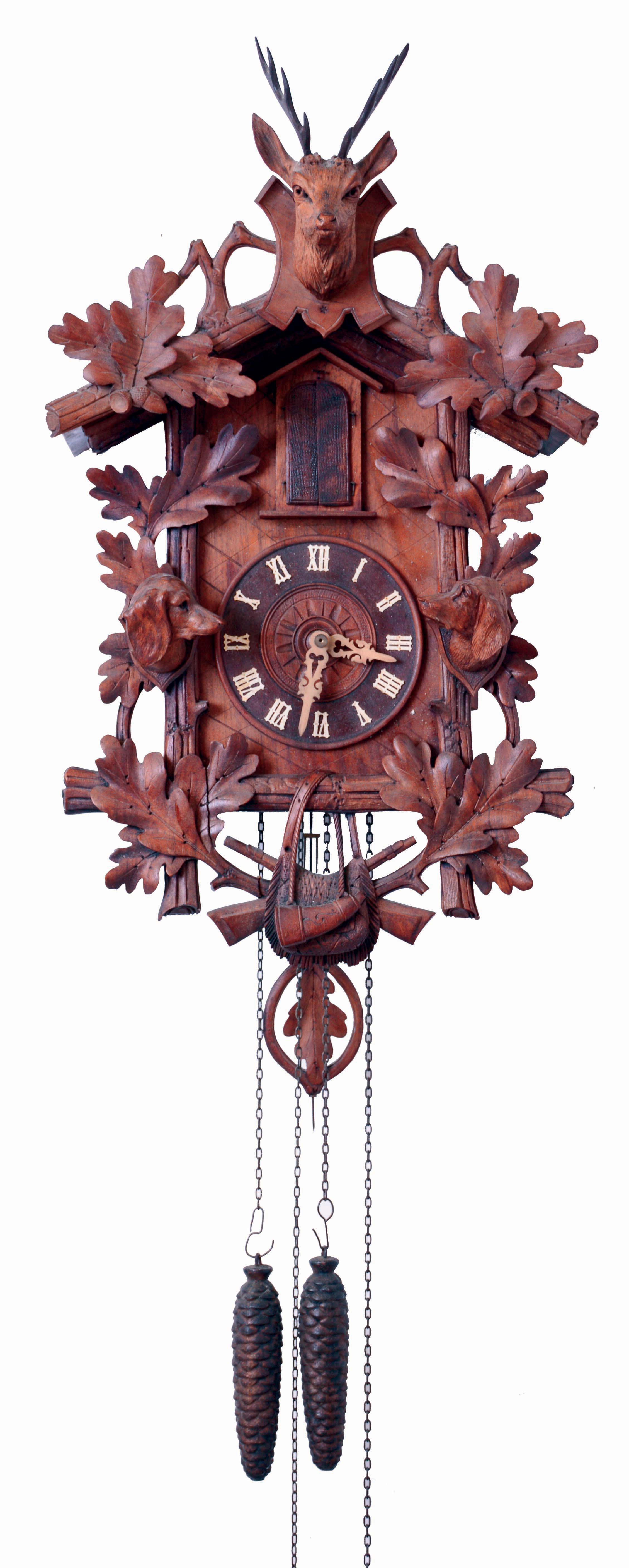 German, Black Forest, Two Note Trumpeter, in a hunting motif case, flanked by well detailed dog's heads, guns and powder flask at bottom, and the top trimmed with a deer head, all with oak leaves surrounding, c1900 — Antique Clocks Price Guide