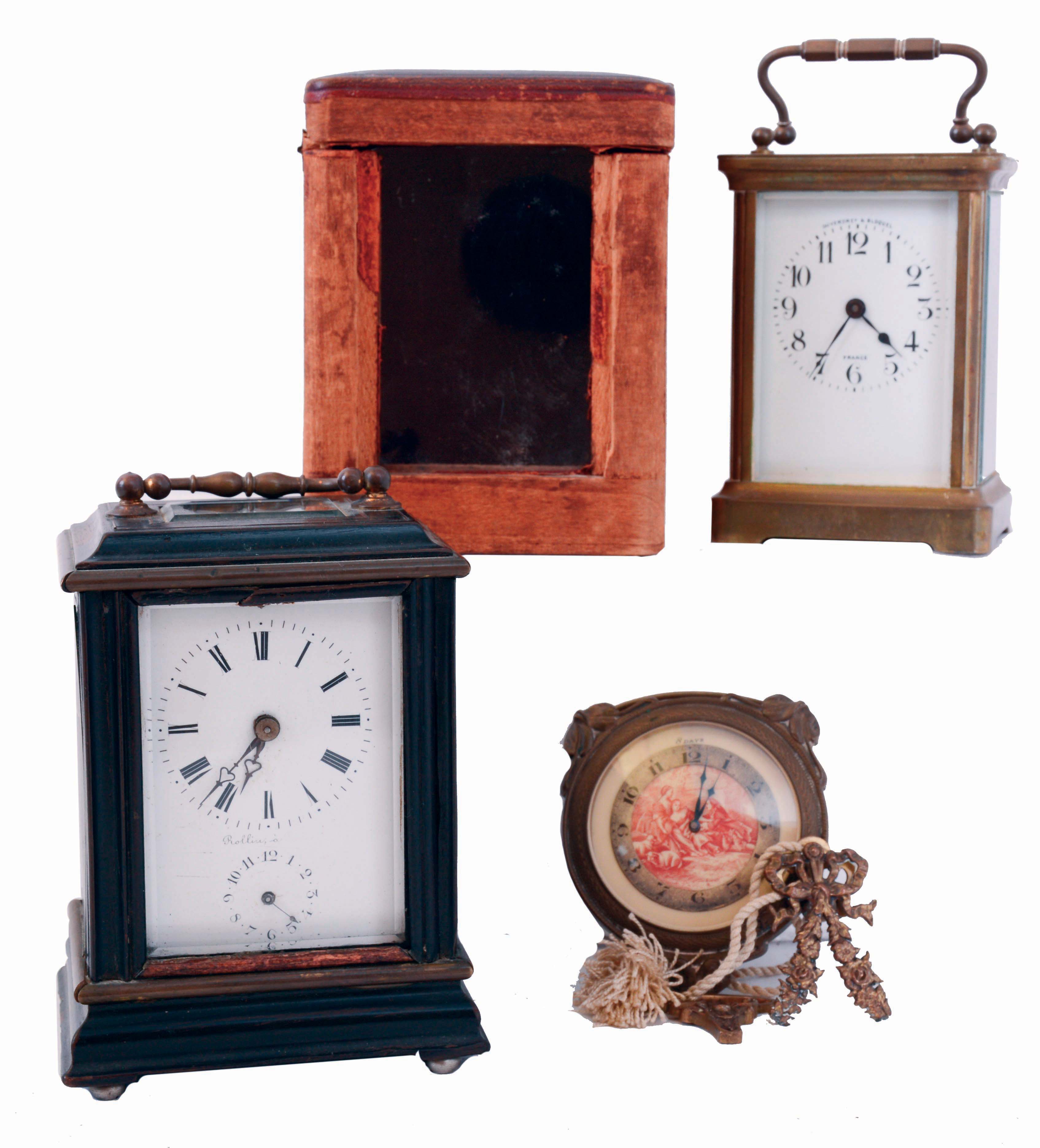 Clocks- 3 (Three): Two French carriage clocks, the first by Rollin a Paris, ebonized wood case with brass stringing and moldings, beveled glass at top and front, Roman numeral white enamel dial, 8 days time and alarm movement with lever platform, mid 19th century, the other marked "Duverdrey & Bloquel", with gilt brass case, Arabic numeral white enamel dial, 8 days timepiece movement with cylinder platform, with outer case, c1900, together with a Swiss, 8 days chatelaine clock with lever escapement, c1900 — Antique Clocks Price Guide