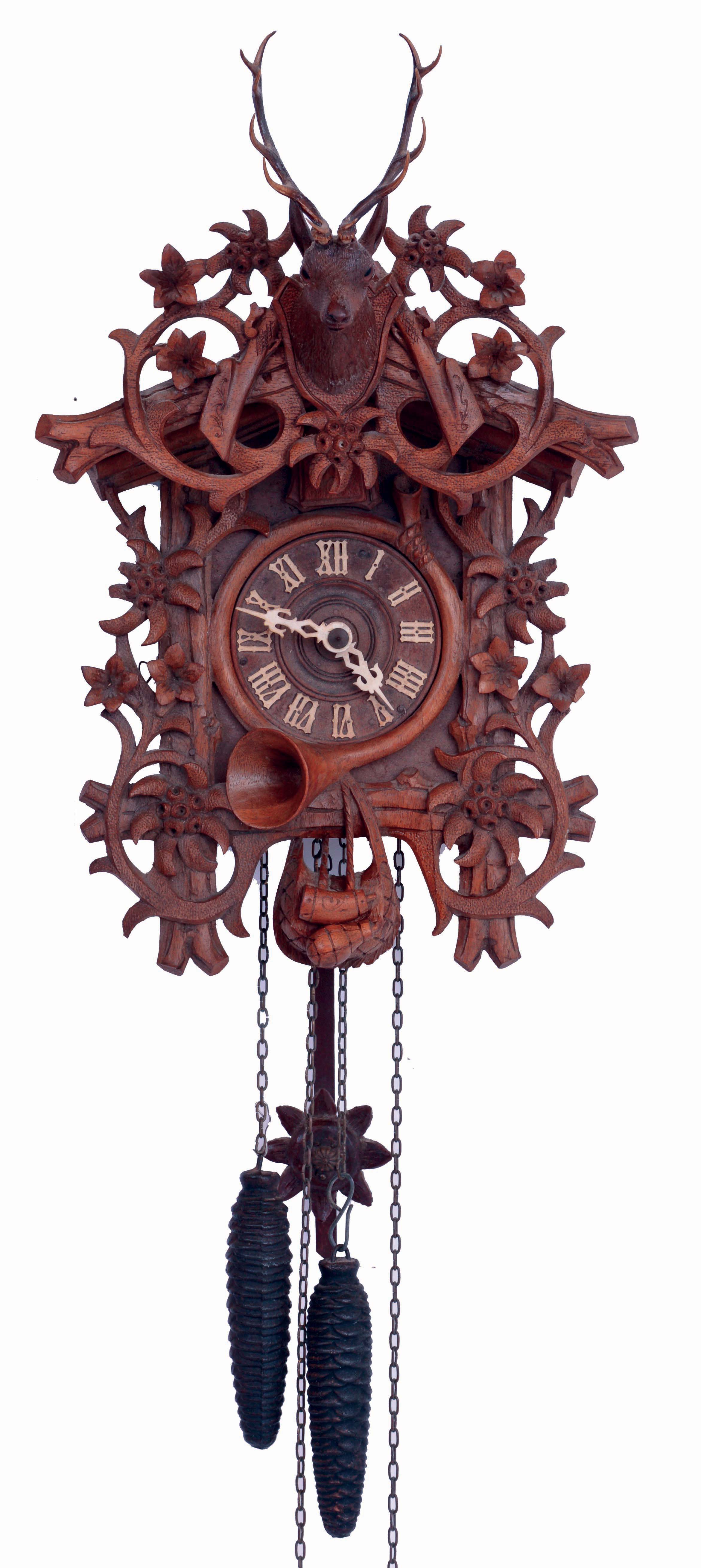 German, Black Forest cuckoo, smaller size but with highly detailed carving of edelweiss flowers, surmounted by a finely detailed stags head, c1920 — Antique Clocks Price Guide