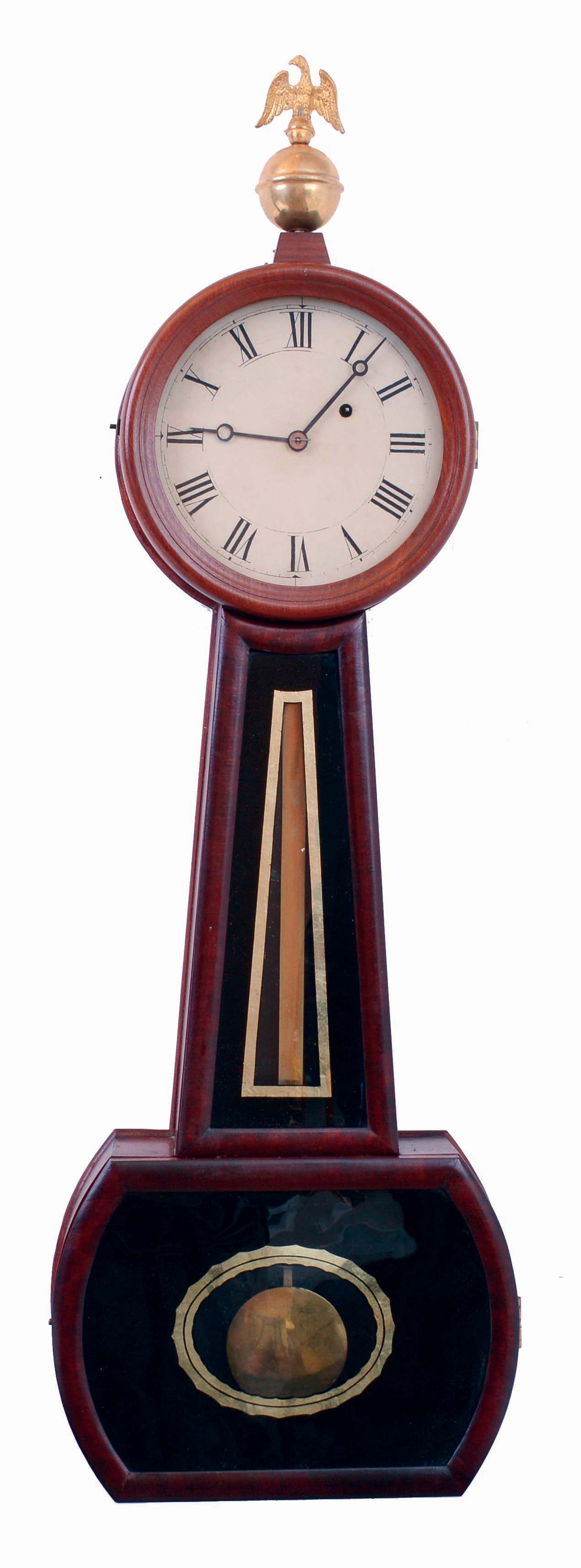 Attleboro type banjo wall clock, 8 days, time only, weight driven movement in a mahogany and mahogany veneer case with a painted metal dial and reverse painted throat and lower tablets, c1860 — Antique Clocks Price Guide
