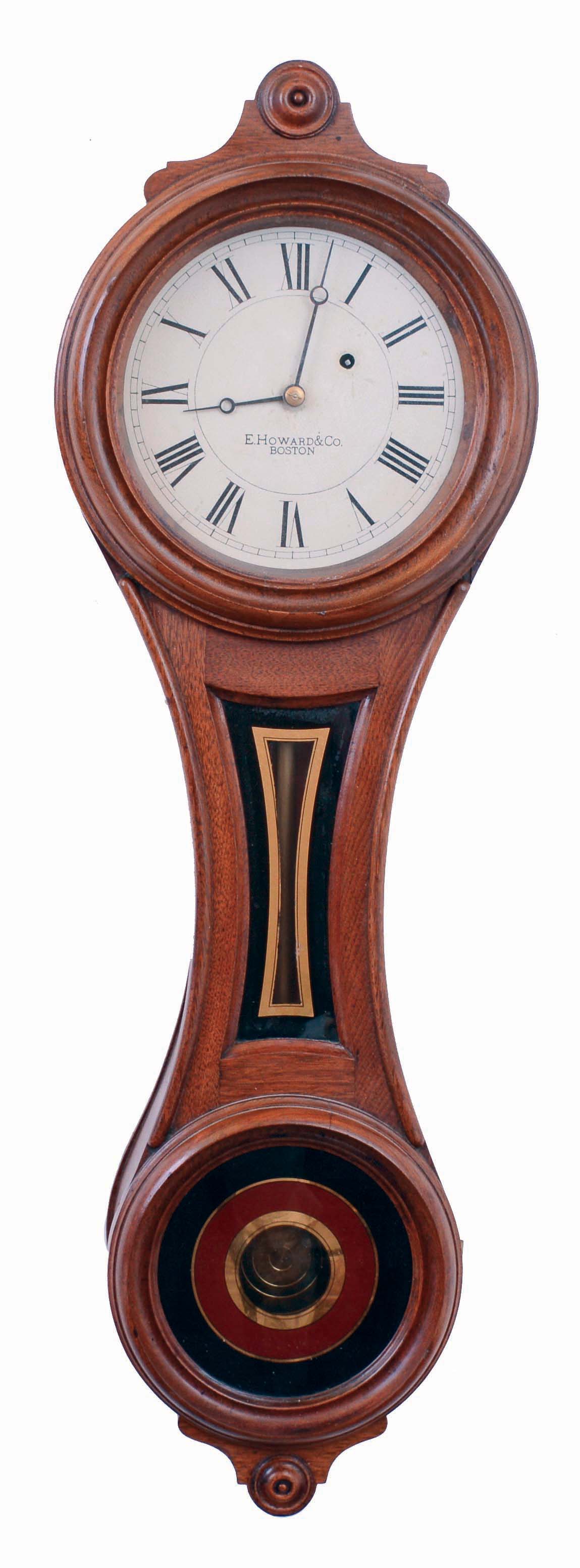 E. Howard & Co., Boston, Mass., "No. 10 Regulator" figure eight wall clock, 8 days, time only, weight driven movement in a walnut case with painted metal dial and reverse painted tablets, c1885 — Antique Clocks Price Guide