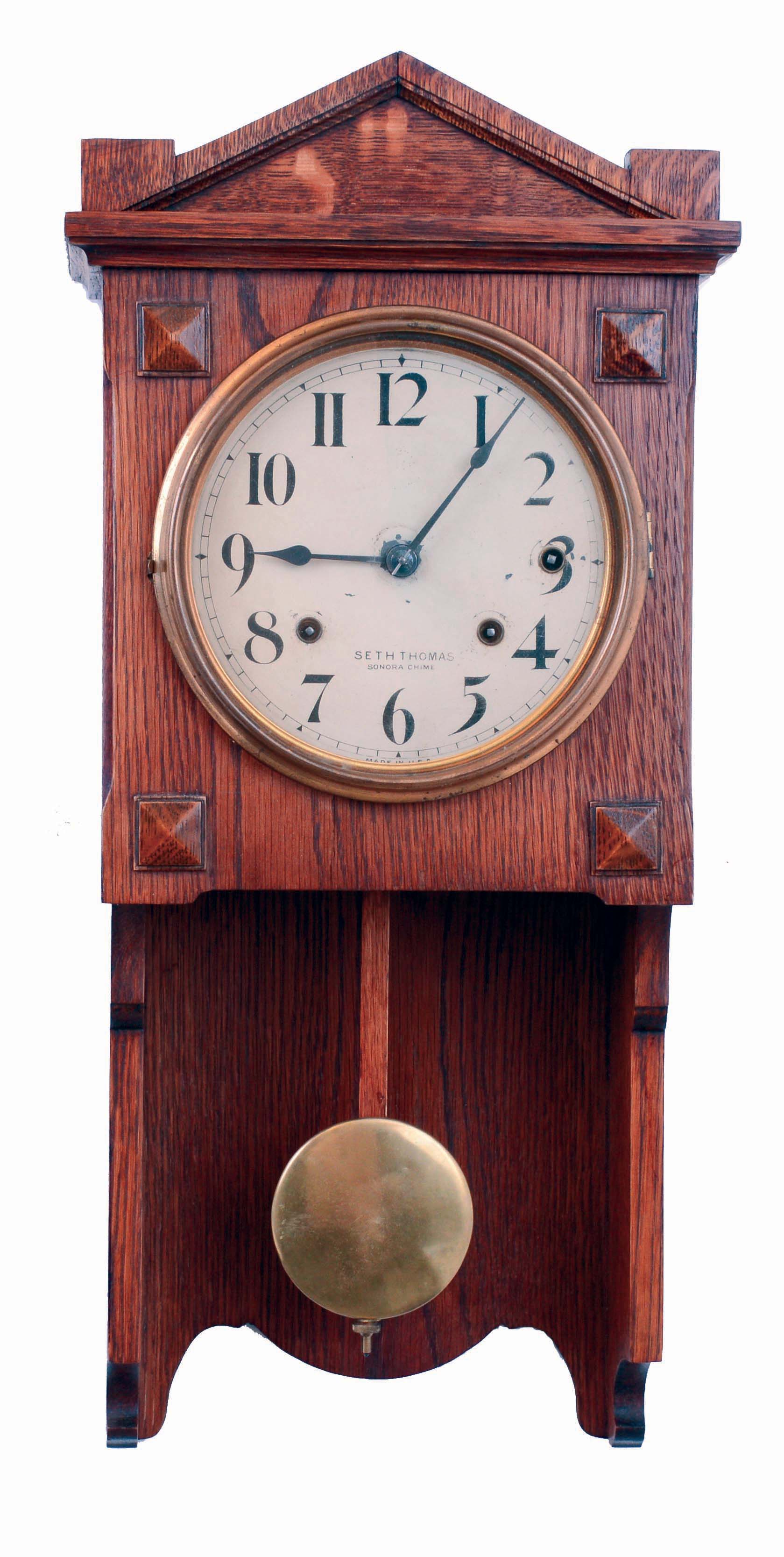 Seth Thomas Clock Co., Thomaston, Conn., "Chime Clock No. 101" hanging 4 bell Sonora chime wall clock in Arts & Crafts style oak case with painted metal dial, c1914 — Antique Clocks Price Guide
